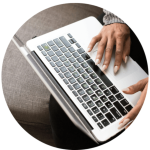 African American woman's hands using laptop